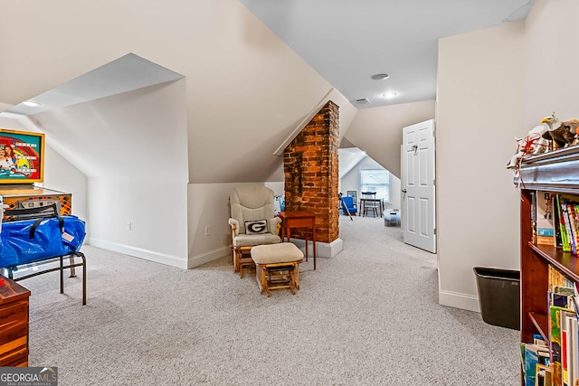 2173 Conyers St SE, Covington, GA 30014 - living area with carpet, vaulted ceiling, and baseboards