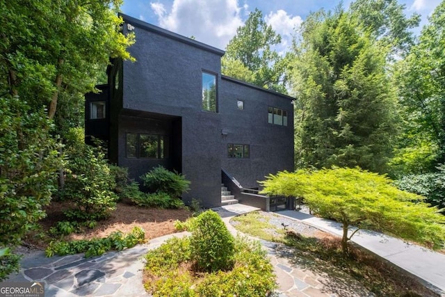 4 W Wesley Rdg NW, Atlanta, GA 30327 - view of front facade with stucco siding