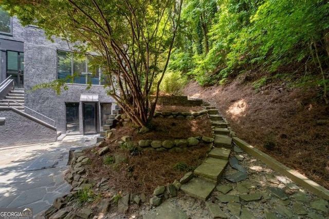 4 W Wesley Rdg NW, Atlanta, GA 30327 - view of yard featuring stairway and a patio area