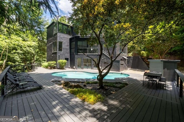 4 W Wesley Rdg NW, Atlanta, GA 30327 - wooden terrace featuring a sunroom and outdoor dining area