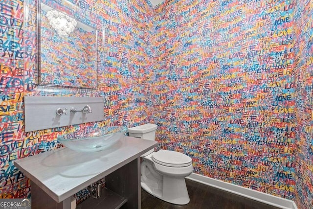 4 W Wesley Rdg NW, Atlanta, GA 30327 - bathroom featuring wallpapered walls and wood finished floors