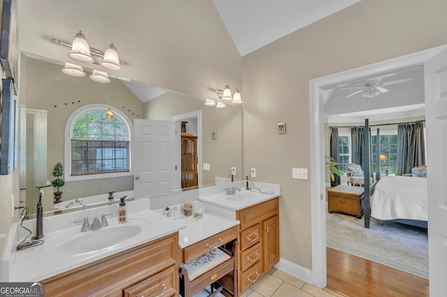 11 Creekwood Dr, Dublin, GA 31021 - full bathroom with a sink, ensuite bathroom, vaulted ceiling, and ceiling fan