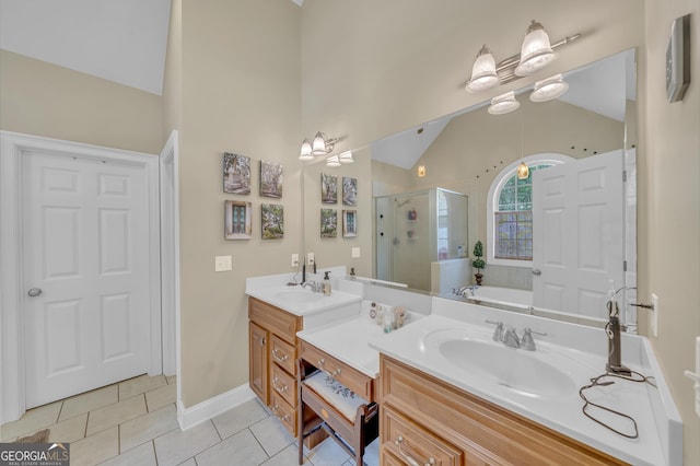 11 Creekwood Dr, Dublin, GA 31021 - full bath featuring a sink, a shower stall, lofted ceiling, tile patterned flooring, and double vanity