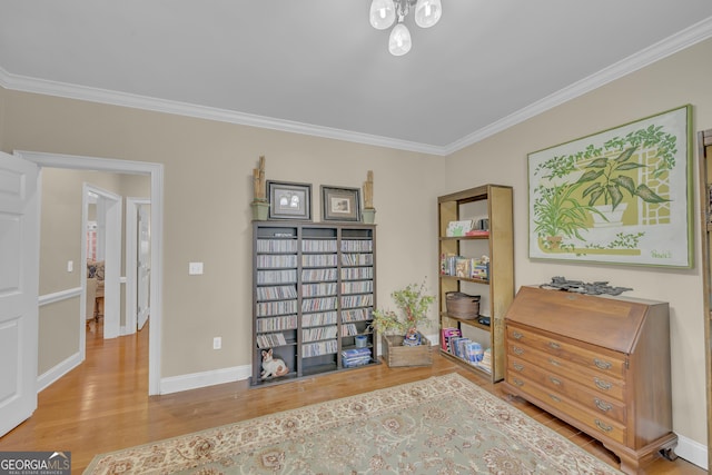 11 Creekwood Dr, Dublin, GA 31021 - living area with baseboards, wood finished floors, and crown molding