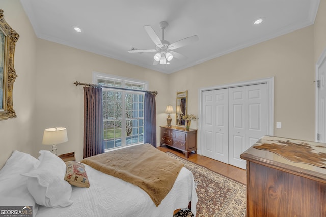 11 Creekwood Dr, Dublin, GA 31021 - bedroom featuring crown molding, a closet, a ceiling fan, wood finished floors, and recessed lighting