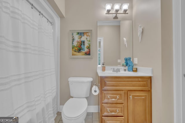 11 Creekwood Dr, Dublin, GA 31021 - bathroom featuring tile patterned floors, toilet, baseboards, and vanity
