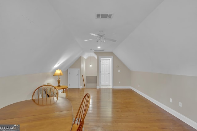 11 Creekwood Dr, Dublin, GA 31021 - additional living space with vaulted ceiling, baseboards, light wood-style floors, visible vents, and a ceiling fan