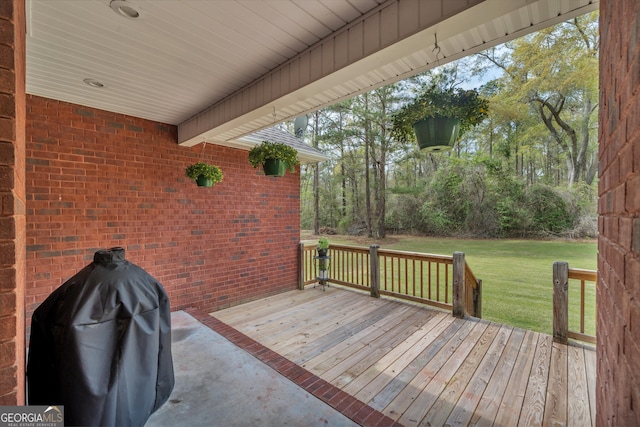 11 Creekwood Dr, Dublin, GA 31021 - wooden deck featuring area for grilling and a yard