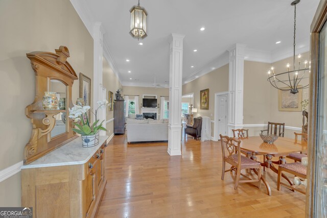 11 Creekwood Dr, Dublin, GA 31021 - dining room featuring decorative columns, light wood-style floors, and recessed lighting