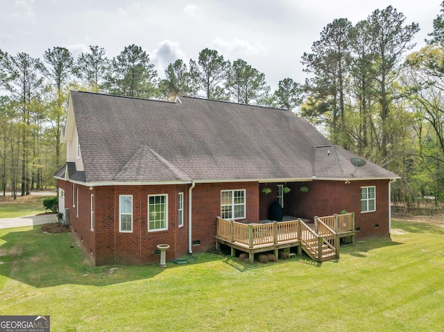 11 Creekwood Dr, Dublin, GA 31021 - rear view of house featuring a shingled roof, a lawn, a wooden deck, and brick siding