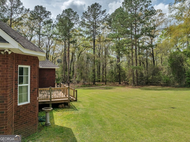 11 Creekwood Dr, Dublin, GA 31021 - view of yard featuring a wooden deck
