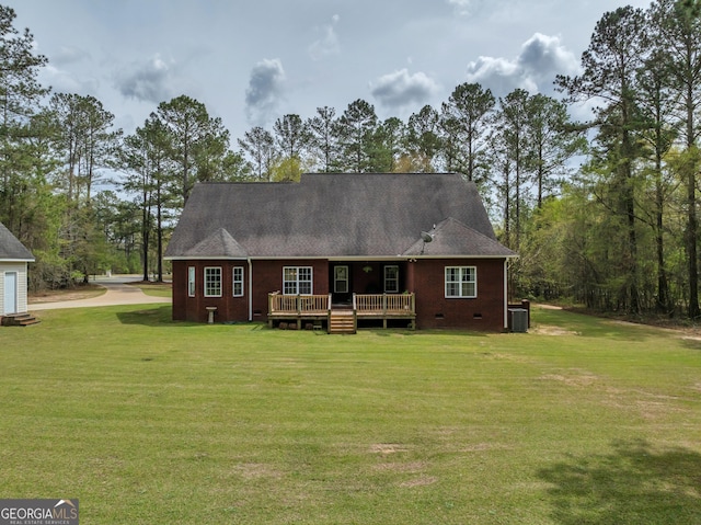 11 Creekwood Dr, Dublin, GA 31021 - back of property featuring a deck, crawl space, and a yard
