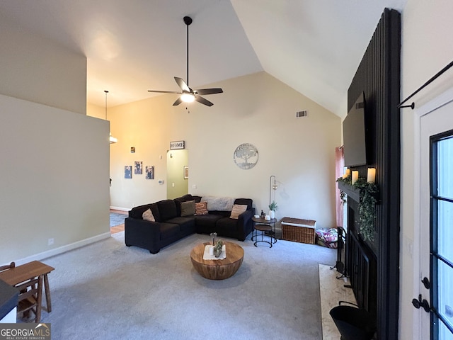 924 Morningside Dr, Griffin, GA 30224 - living area featuring a fireplace, carpet flooring, a ceiling fan, high vaulted ceiling, and baseboards