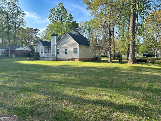 924 Morningside Dr, Griffin, GA 30224 - view of green lawn featuring a wooden deck