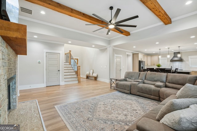 4426 Oxburgh Park, Flowery Branch, GA 30542 - living area with a ceiling fan, stairway, beam ceiling, light wood-style floors, and recessed lighting