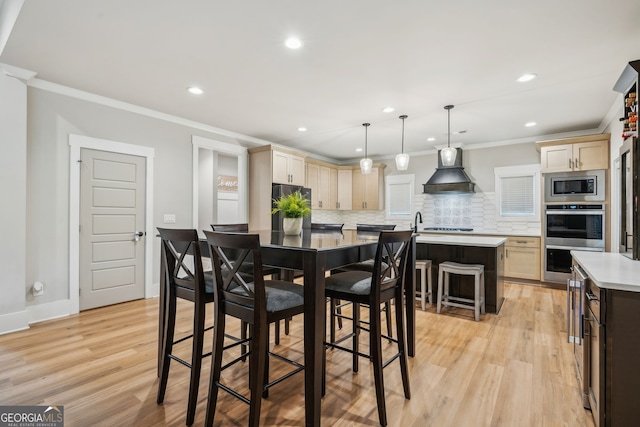 4426 Oxburgh Park, Flowery Branch, GA 30542 - dining space featuring crown molding, light wood-style flooring, and recessed lighting