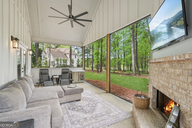 4426 Oxburgh Park, Flowery Branch, GA 30542 - sunroom featuring an outdoor stone fireplace, ceiling fan, and lofted ceiling