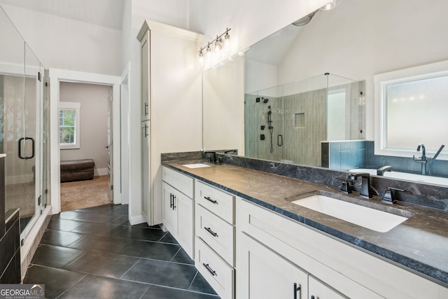 4426 Oxburgh Park, Flowery Branch, GA 30542 - full bath with a shower stall, double vanity, tile patterned flooring, and vaulted ceiling