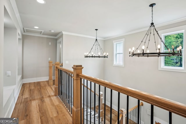 4426 Oxburgh Park, Flowery Branch, GA 30542 - hall featuring an upstairs landing, a chandelier, wood finished floors, recessed lighting, and crown molding