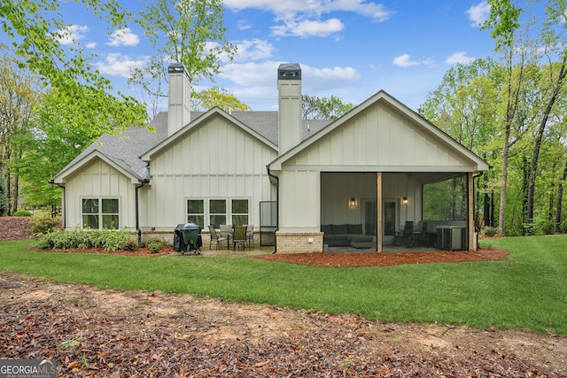 4426 Oxburgh Park, Flowery Branch, GA 30542 - rear view of property with roof with shingles, a chimney, a patio, and board and batten siding