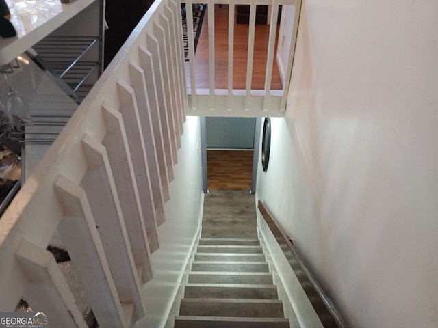 1114 Suncrest Ln, Birmingham, AL 35215 - stairs with wood finished floors