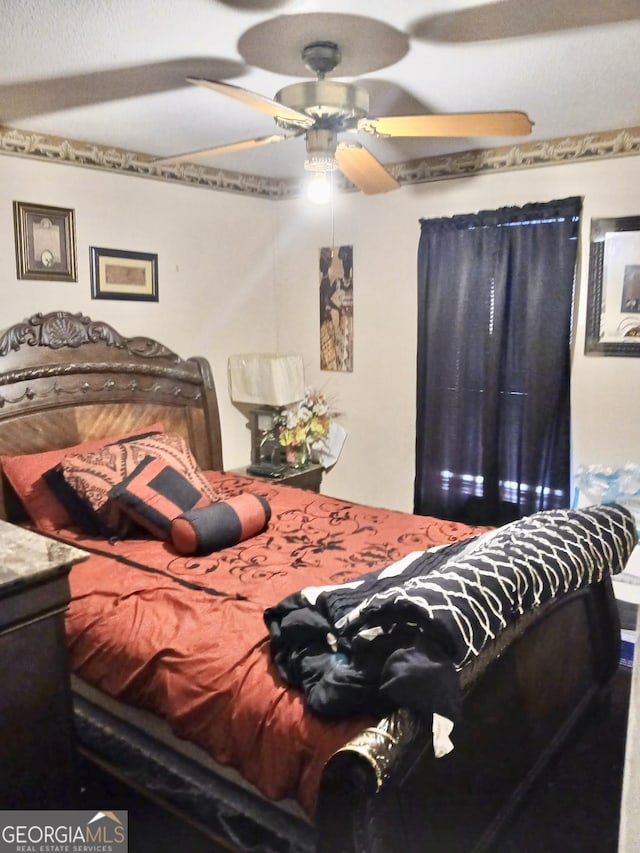 1114 Suncrest Ln, Birmingham, AL 35215 - bedroom with a ceiling fan