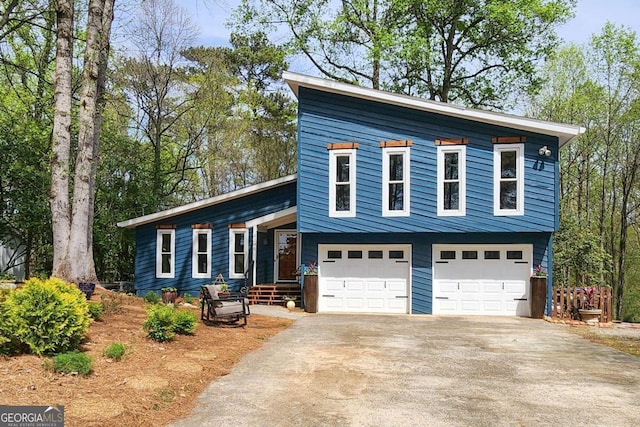 4295 S Berkeley Lake Rd NW, Berkeley Lake, GA 30096 - view of front of house with a garage and concrete driveway