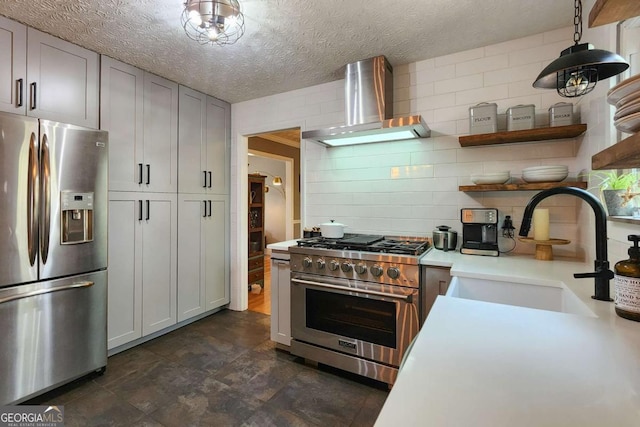 4295 S Berkeley Lake Rd NW, Berkeley Lake, GA 30096 - kitchen featuring appliances with stainless steel finishes, wall chimney exhaust hood, light countertops, open shelves, and a textured ceiling