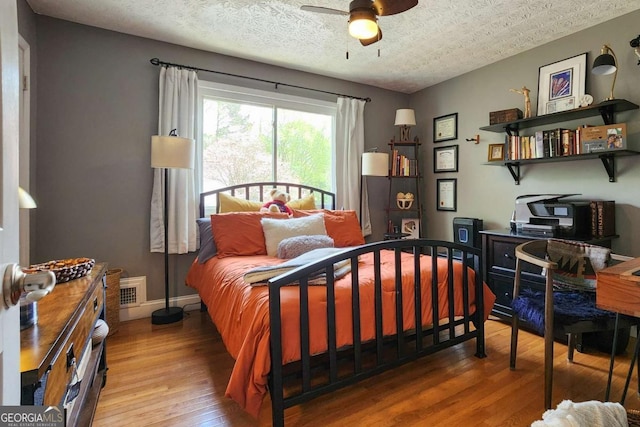 4295 S Berkeley Lake Rd NW, Berkeley Lake, GA 30096 - bedroom featuring wood finished floors and a desk