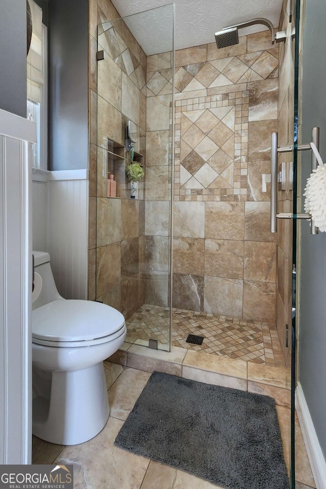 4295 S Berkeley Lake Rd NW, Berkeley Lake, GA 30096 - bathroom featuring a stall shower and wainscoting