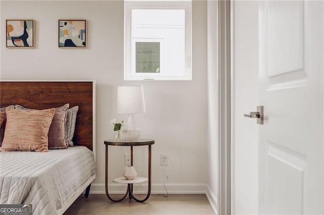 2029 Memorial Dr Unit 32, Atlanta, GA 30317 - bedroom with baseboards and wood finished floors