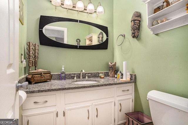 105 Governors Dr, Forest Park, GA 30297 - bathroom with toilet and vanity