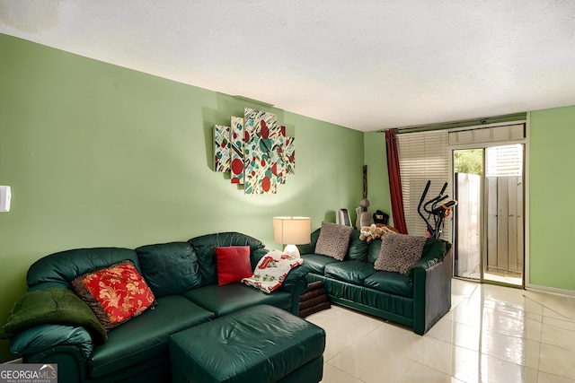 105 Governors Dr, Forest Park, GA 30297 - living area with a textured ceiling and light tile patterned floors