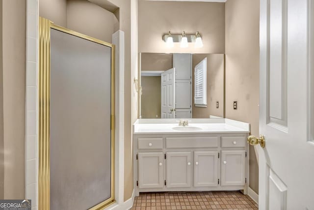 full bathroom featuring a stall shower and vanity