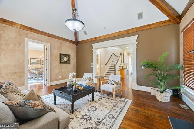 1462 Georgia Club Dr, Statham, GA 30666 - living area featuring stairs, visible vents, wood finished floors, and vaulted ceiling with beams