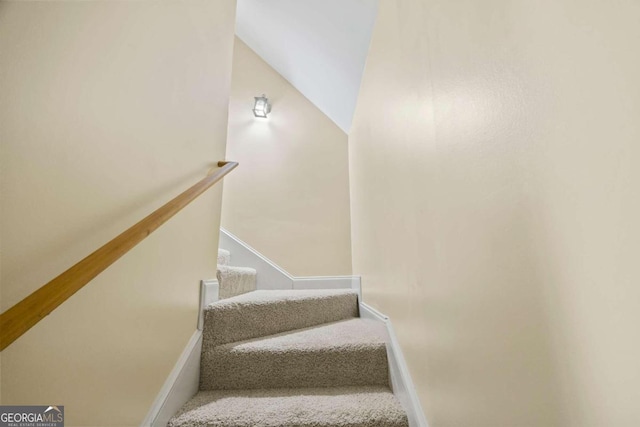 1462 Georgia Club Dr, Statham, GA 30666 - stairway with baseboards and carpet floors
