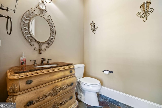 1462 Georgia Club Dr, Statham, GA 30666 - half bath with toilet, vanity, and baseboards