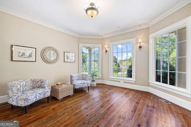 1462 Georgia Club Dr, Statham, GA 30666 - sitting room with baseboards, visible vents, crown molding, and wood-type flooring