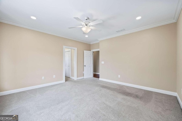 1462 Georgia Club Dr, Statham, GA 30666 - unfurnished room with baseboards, visible vents, ornamental molding, and a ceiling fan