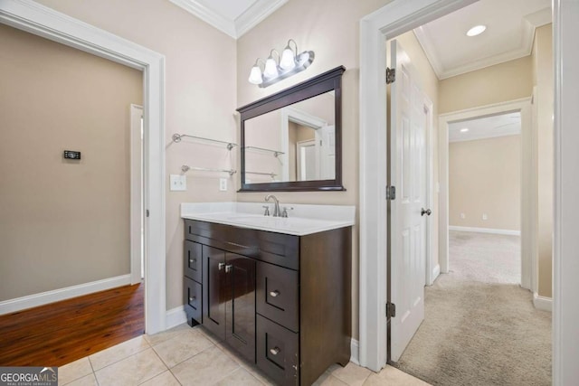 1462 Georgia Club Dr, Statham, GA 30666 - bathroom with baseboards, ornamental molding, recessed lighting, vanity, and tile patterned flooring