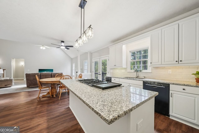 740 Trillium Ln, Lilburn, GA 30047 - kitchen featuring black dishwasher, a sink, open floor plan, ceiling fan, and french doors
