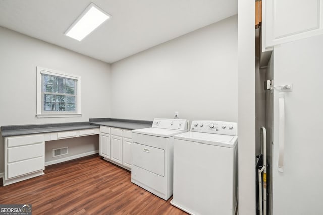 740 Trillium Ln, Lilburn, GA 30047 - laundry area featuring washer and clothes dryer, cabinet space, dark wood-type flooring, and an office area