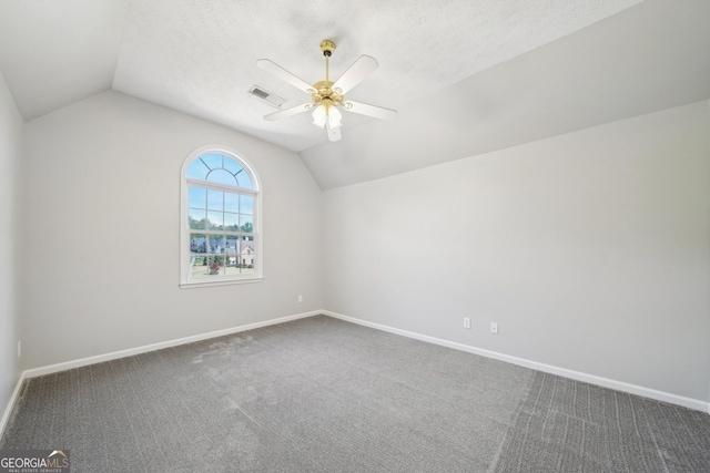 740 Trillium Ln, Lilburn, GA 30047 - bonus room featuring vaulted ceiling, a ceiling fan, carpet, and baseboards