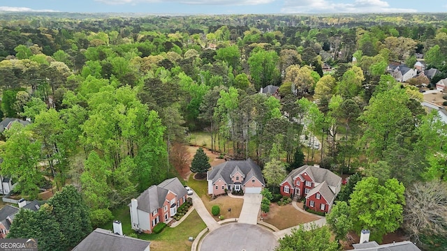 740 Trillium Ln, Lilburn, GA 30047 - aerial perspective of suburban area with a forest