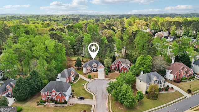 740 Trillium Ln, Lilburn, GA 30047 - aerial view of residential area with a heavily wooded area