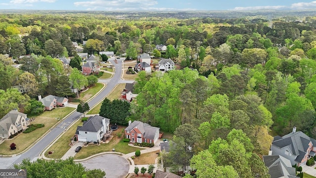 740 Trillium Ln, Lilburn, GA 30047 - aerial view of property's location featuring a heavily wooded area and nearby suburban area