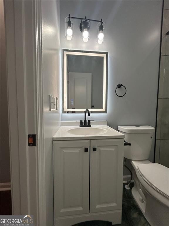 4321 Austell Powder Springs Rd SW, Powder Springs, GA 30127 - bathroom featuring toilet and vanity
