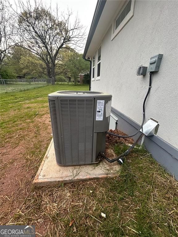 4321 Austell Powder Springs Rd SW, Powder Springs, GA 30127 - exterior view of a central air condition unit and stucco siding