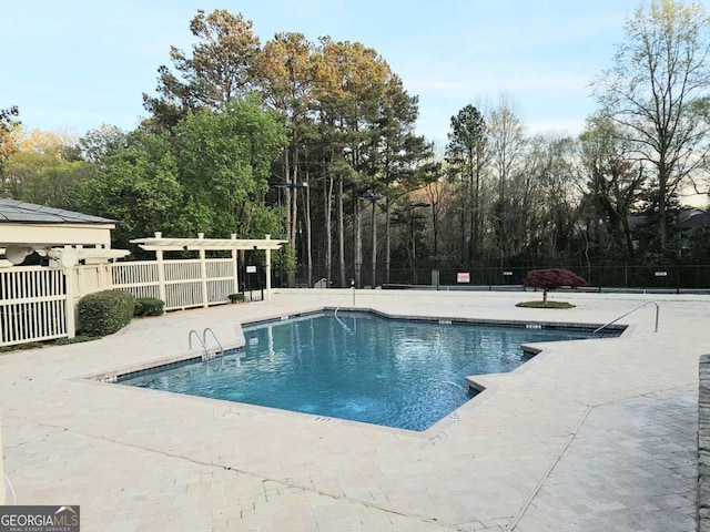 35 Rumson Ct SE, Smyrna, GA 30080 - pool featuring fence and a patio