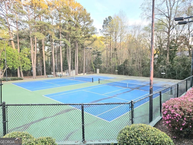 35 Rumson Ct SE, Smyrna, GA 30080 - view of tennis court with fence and community basketball court